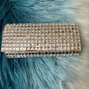 Silver studded clutch